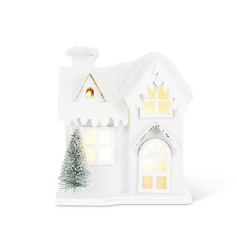 Small Lit Snowy House