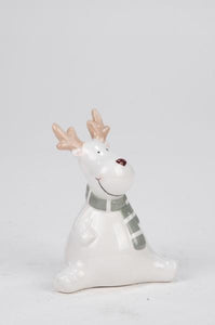Whimsical Sitting White Reindeer