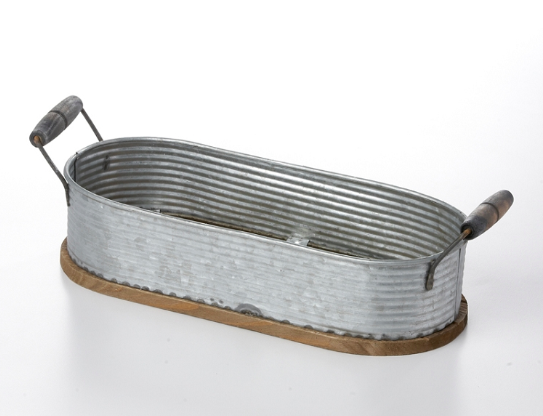 Rustic, metal tub with handles