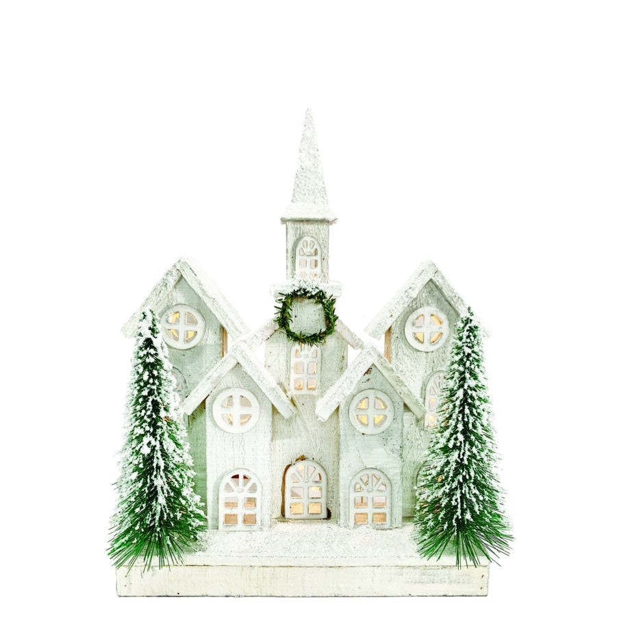 Snowy Wooden House w Church Backdrop